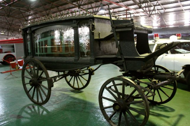An eerie funeral carriage complete with coffin...