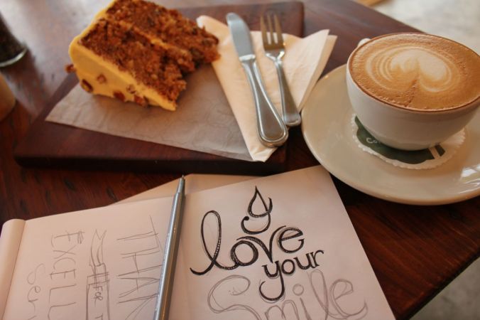 Drawing at coffee shops... with a regular supply of coffee - and a slice of moist carrot cake!
